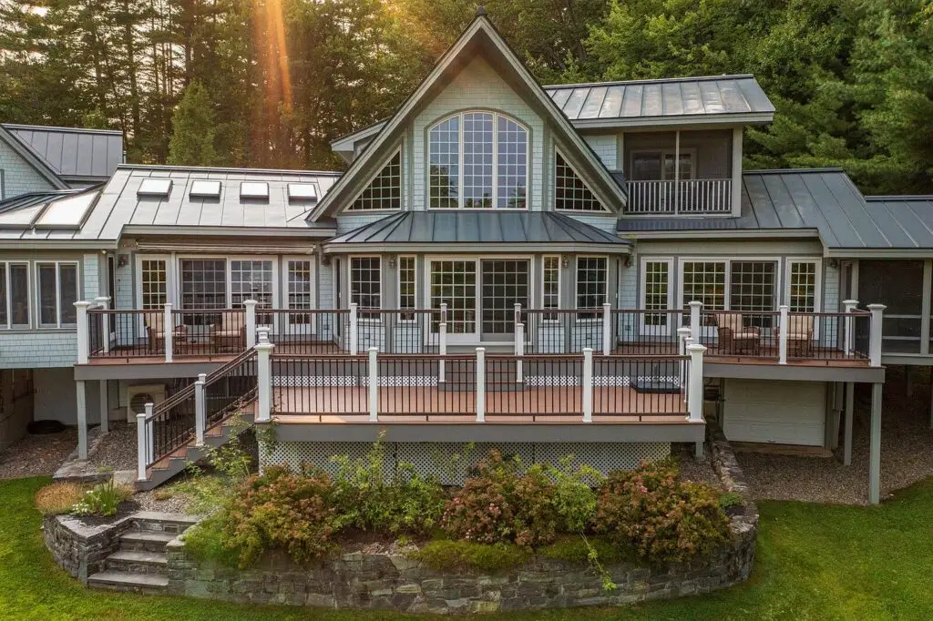Back of the lakefront house with expansive Trex deck overlooking Wilson Lake