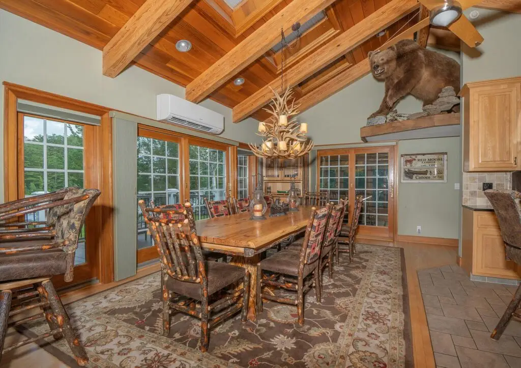 Dining room with real-antler chandelier over the table