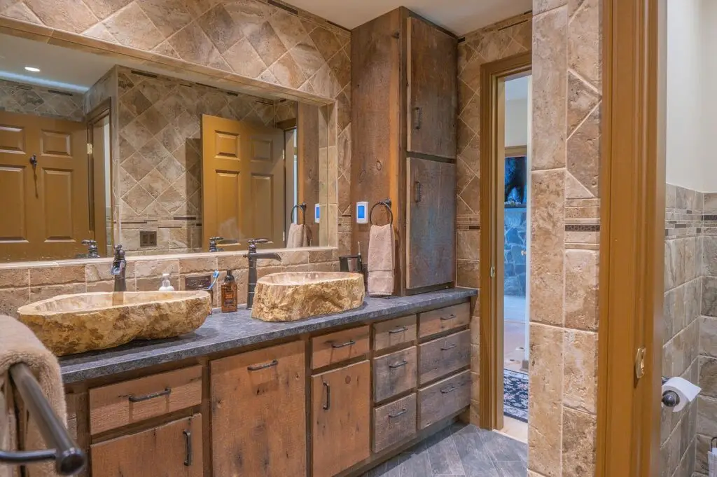 Bathroom with double vanity and custom cabinetry