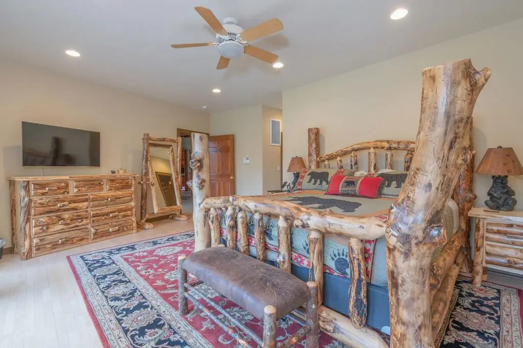 Primary bedroom with Amish log bedroom furniture