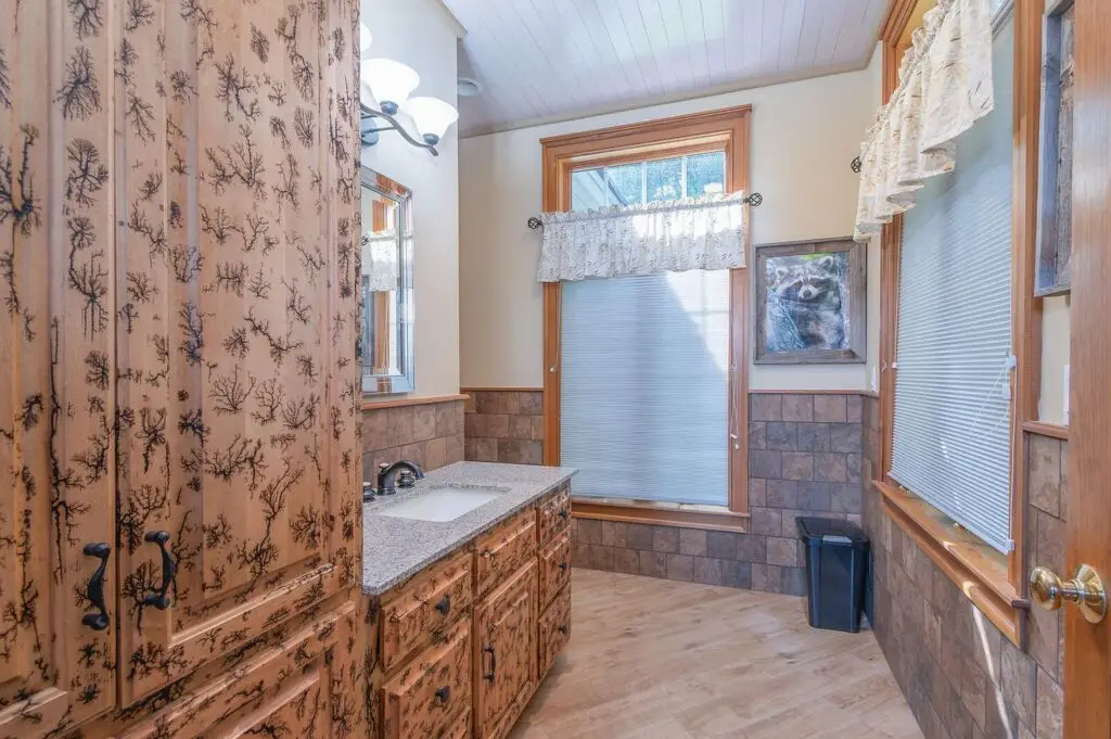Bathroom with custom hand-finished cabinetry