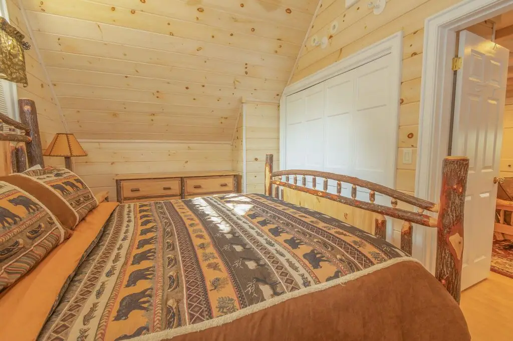 Guest apartment bedroom set under the attic slope