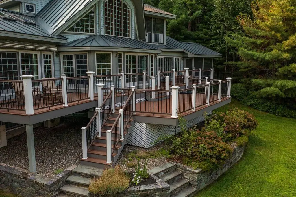 Deck stairs leading down toward the lawn and lake