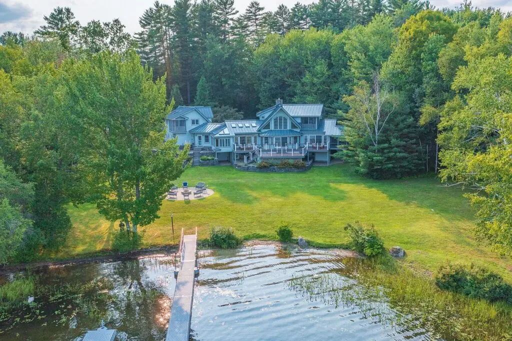 Aerial view from over Wilson Lake looking back at the dock and house