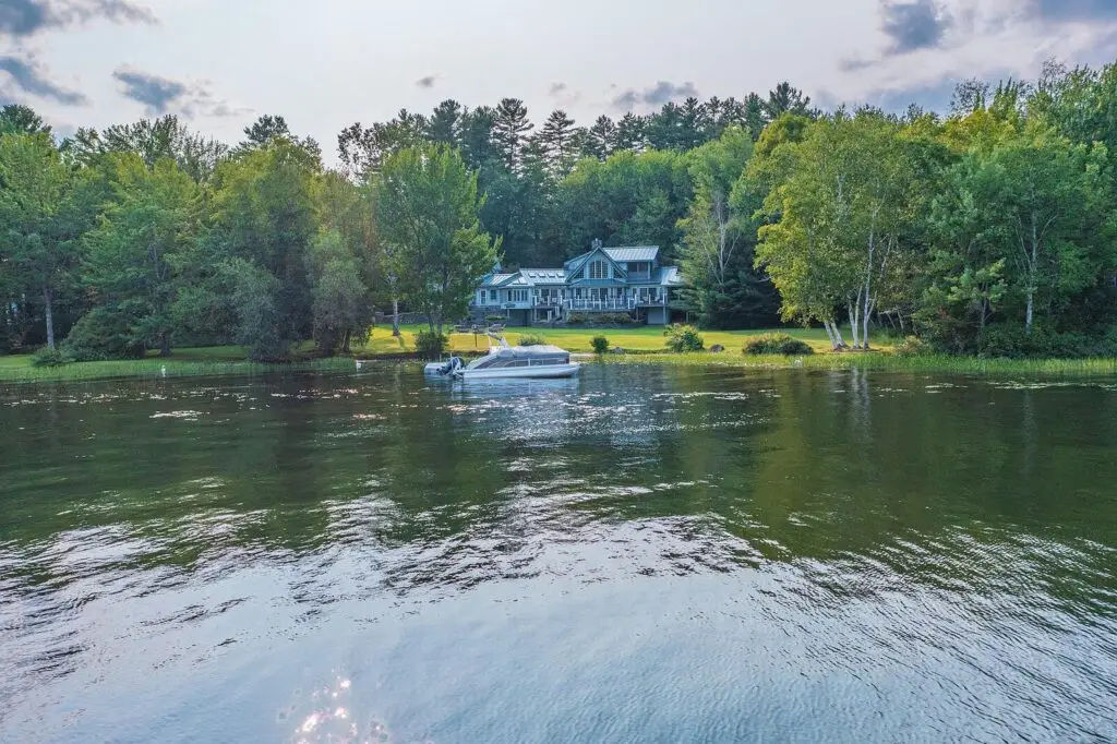 The pontoon boat and shoreline seen from out on Wilson Lake