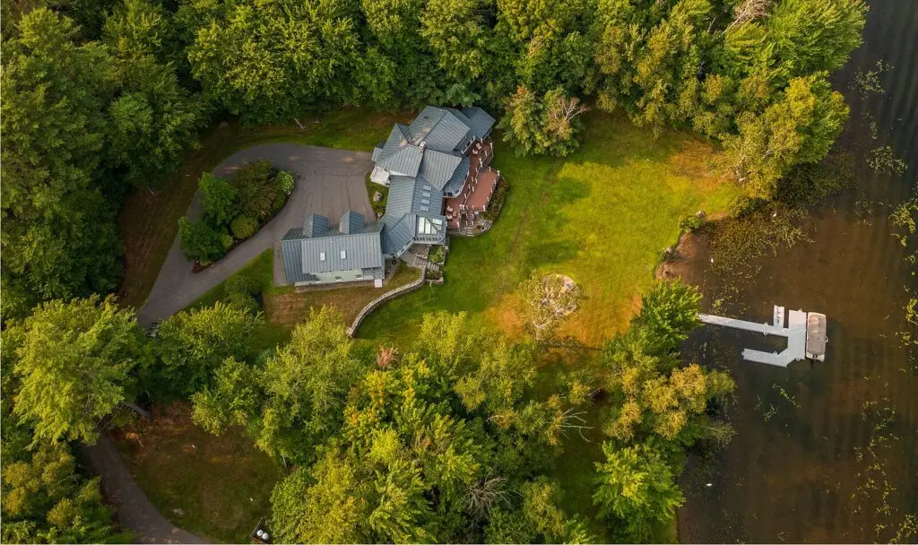 Overhead aerial showing the circular driveway and the dock