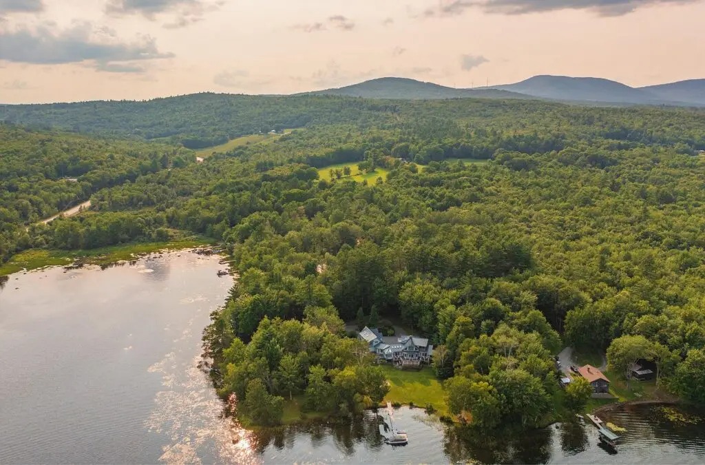 Aerial of the property with the western Maine hills on the horizon