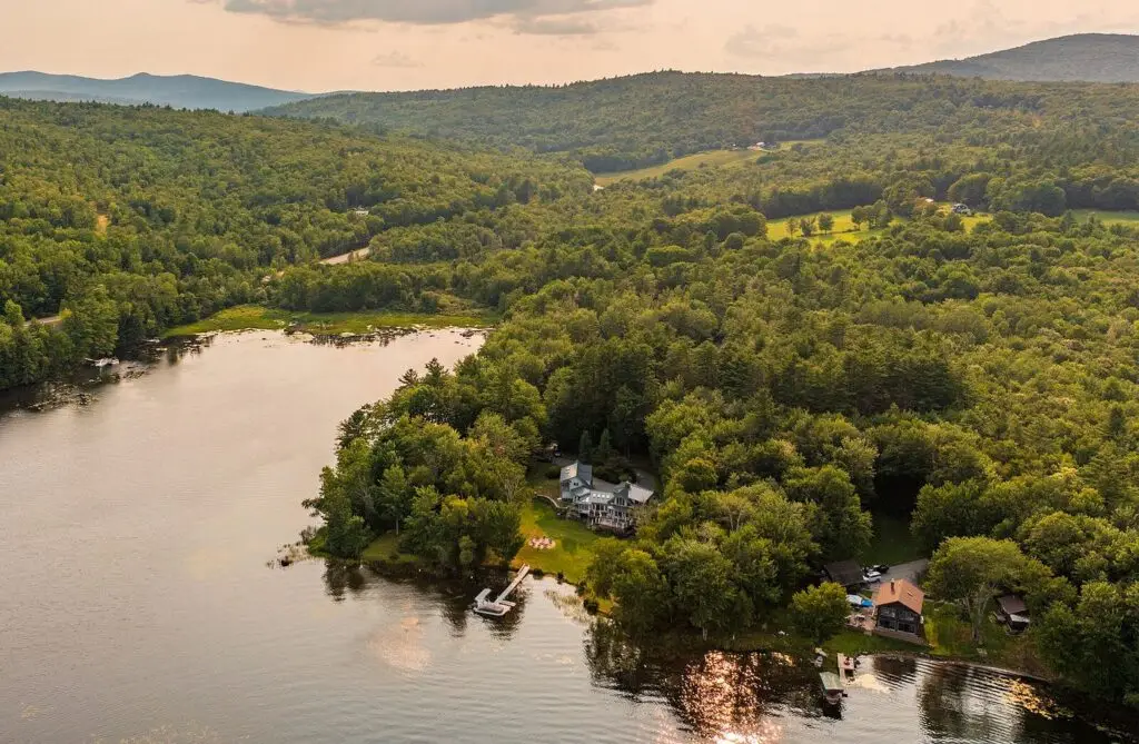 Aerial view of the point and Wilson Lake frontage at golden hour