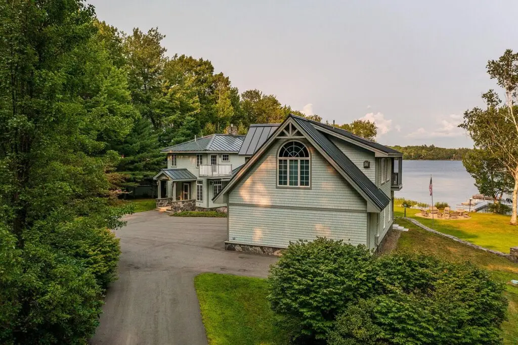 Aerial view of the front driveway with Wilson Lake beyond